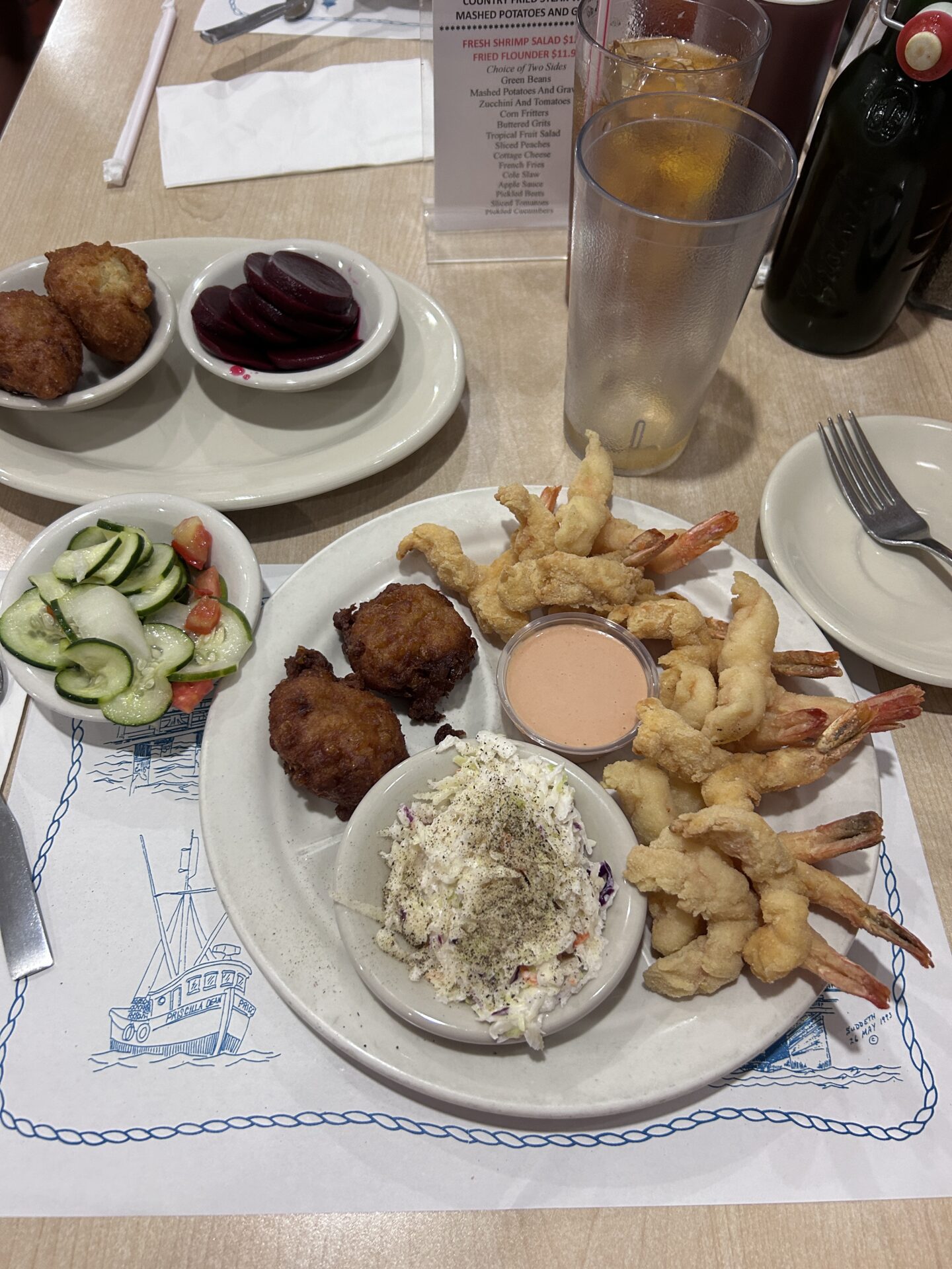 O’Steen’s world renowned fried shrimp and pink sauce. That swing top bottle in the top right of the photo is their homemade datil pepper sauce.